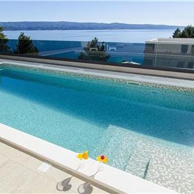 5 bedroom beachfront villa with heated pool near Omis, sleeps 9